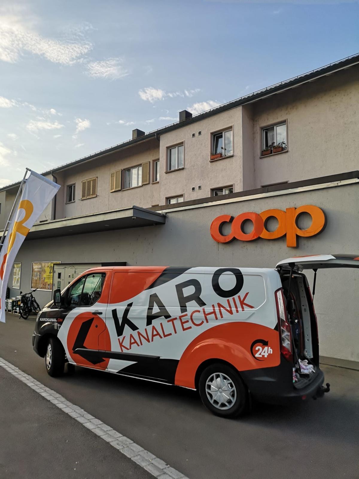 Kanalreinigung bei einer Coop-Filiale